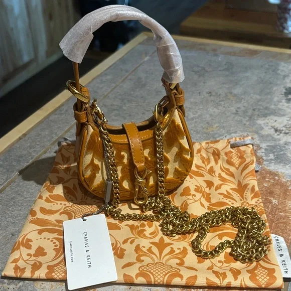 Charles & Keith Shimmering Gold Mini Bag - Picture 1 of 1
